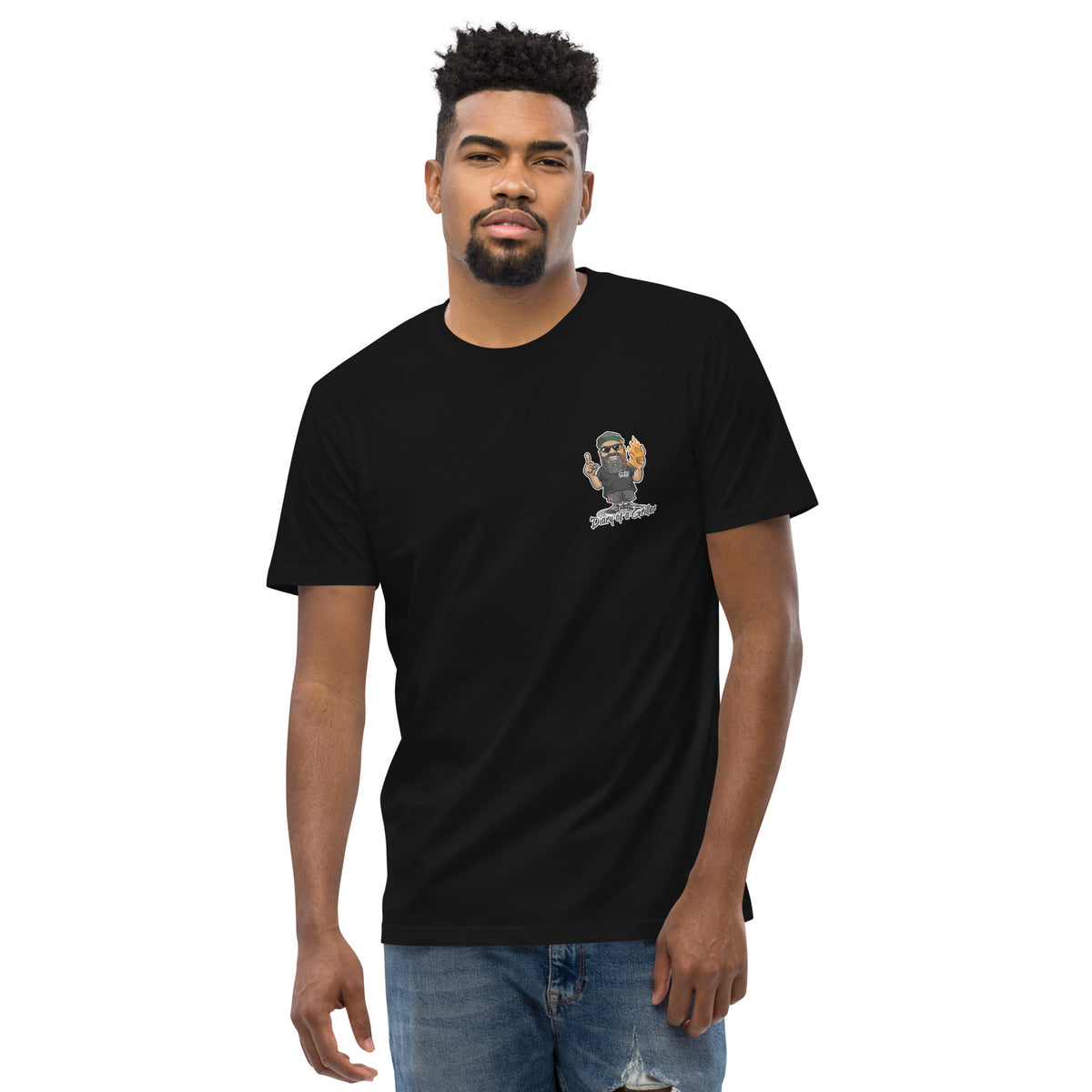 Man wearing the black tee from the front, the small chest badge just visible
